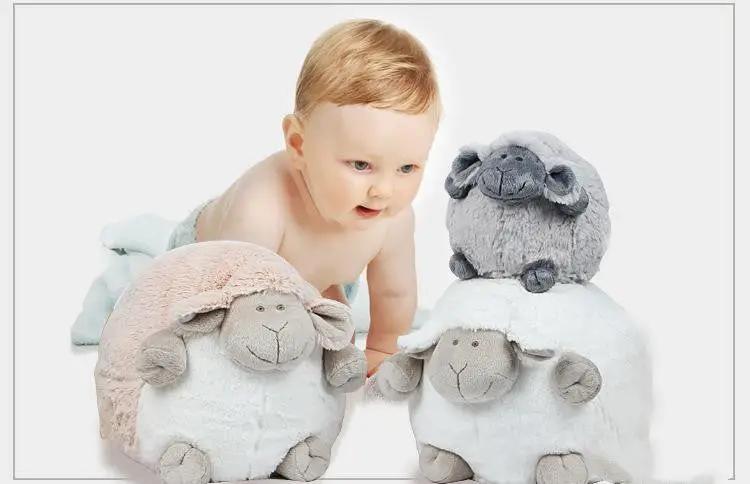 Baby Playing with Fluffy Sheep Stuffed Animals