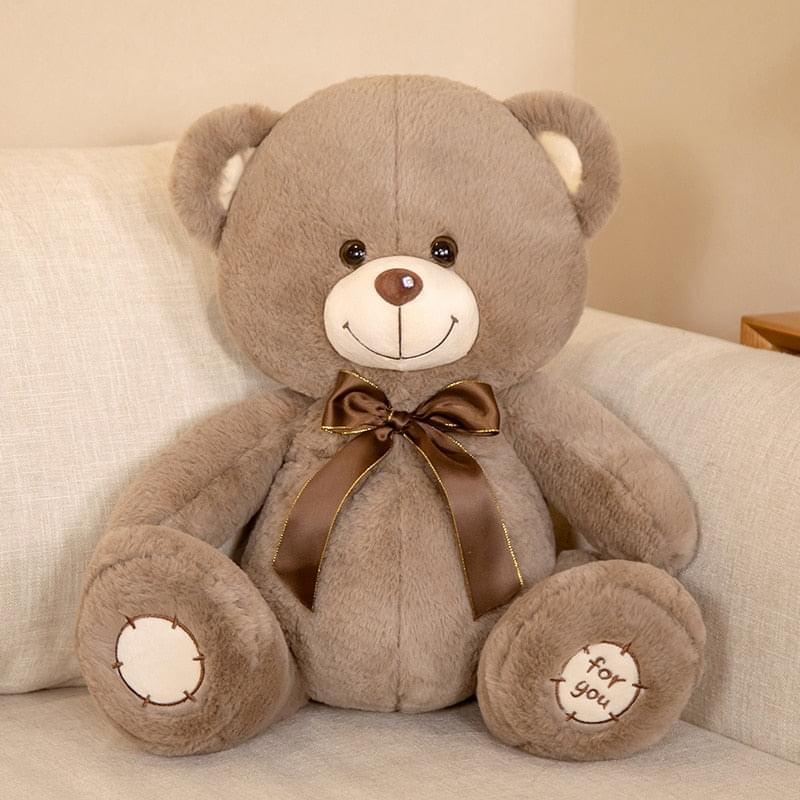 High-quality plush bear in tan brown color, perfect for gifting